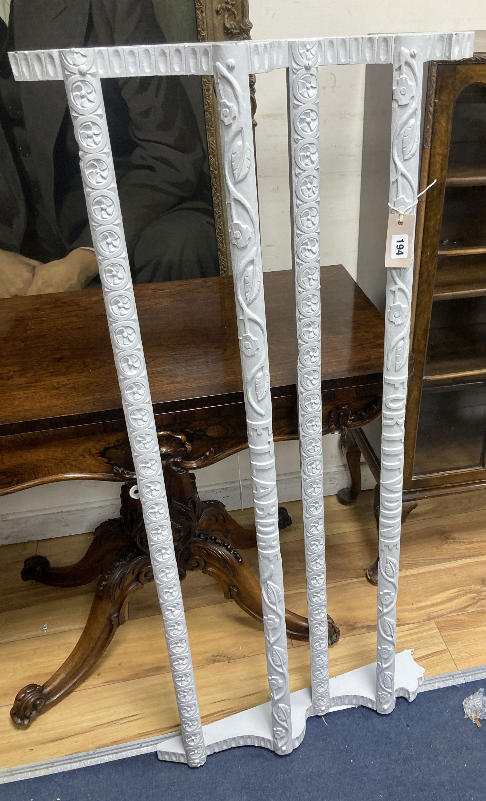 A 19th century carved painted wood plate rack, length 122cm, height 56cm